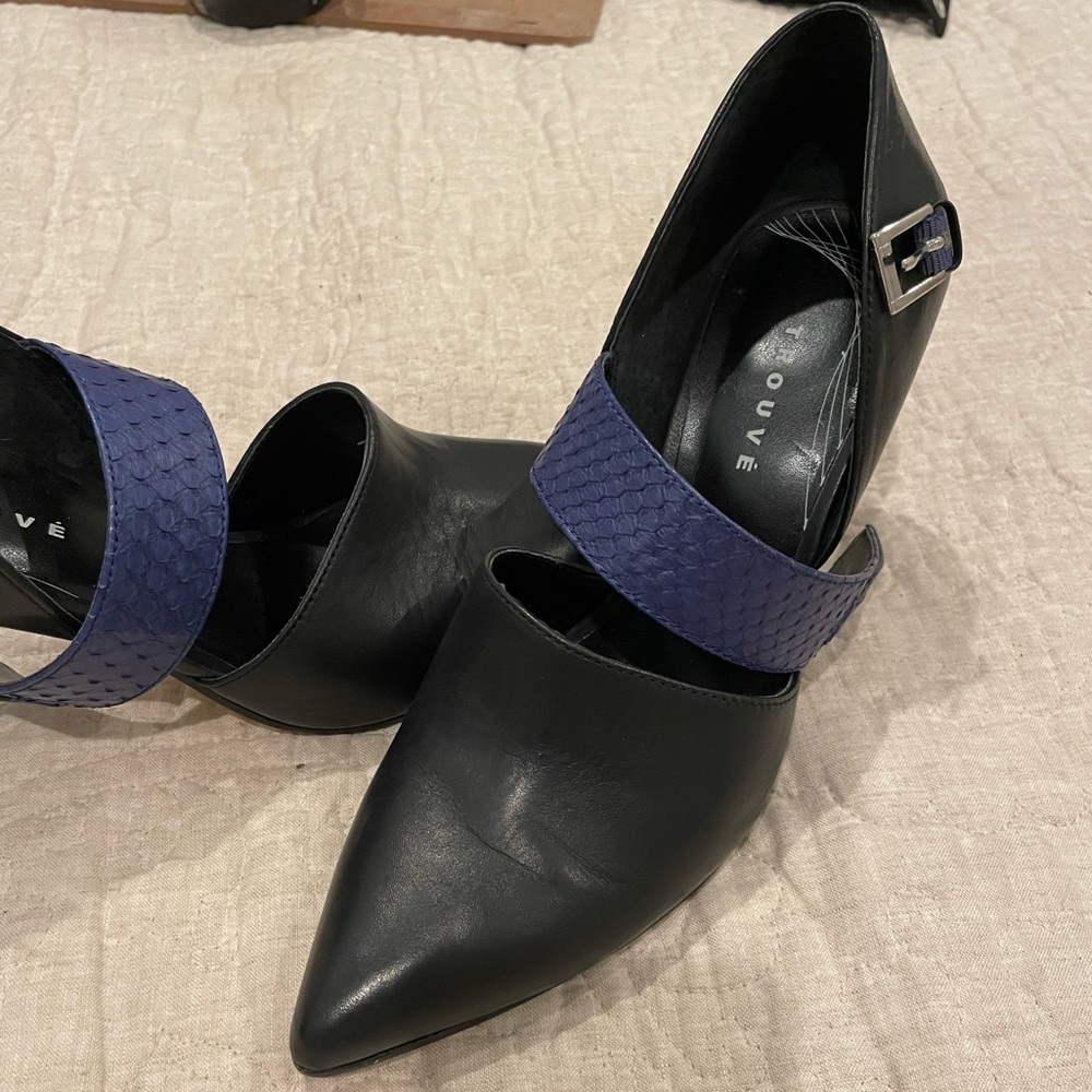 Trouve heels size 7. Black with blue snake print strap. Good condition.